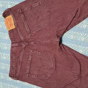 Burgandyish color jeans by Levi strauss and co. ,waist is 34 , length is 30